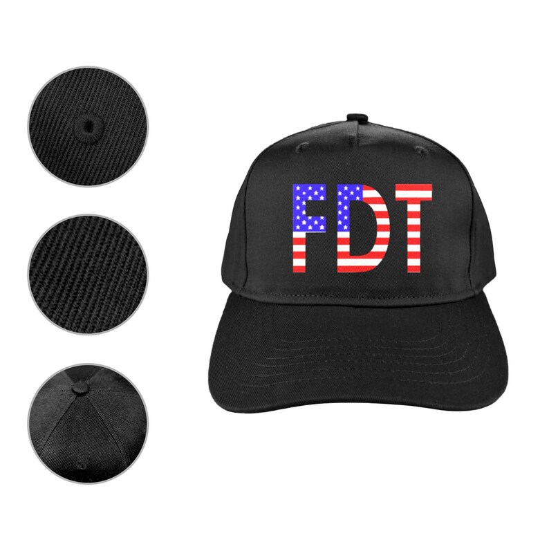 May include: Black baseball cap with the letters "FDT" in a design that resembles the American flag. The cap has a curved brim and a button on top. The image also shows close-ups of the cap's fabric and construction details.