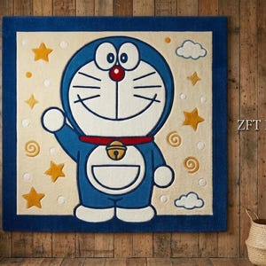 May include: A blue and white Doraemon rug with a blue border. The cartoon character is waving, surrounded by yellow stars and white clouds. The rug is rectangular and has the text "ZFT INTERNATIONAL".
