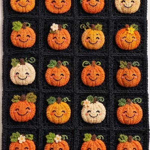 May include: A crochet blanket featuring a grid of twenty black squares, each containing a small, three-dimensional pumpkin with a smiling face. The pumpkins are primarily orange or cream-colored, with green stems, leaves, and occasional small flowers.