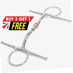 May include: A silver-coloured metal horse bit featuring a full cheek design with round rings at each end and two copper-coloured rings in the centre of the mouthpiece. The image includes a red and black graphic with the text BUY 2 GET 1 FREE.
