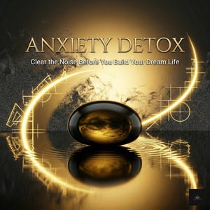 May include: A digital image featuring the words "ANXIETY DETOX" in gold. The text "Clear the Noise Before You Build Your Dream Life" is below. A dark, oval object is reflected in water, with gold light trails and accents.