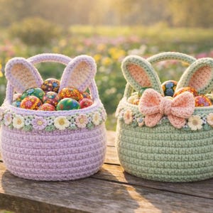May include: Two crochet Easter baskets, one lavender and one green, each adorned with bunny ears and filled with colorful, decorated eggs. The lavender basket has a floral trim, while the green basket features a bow.