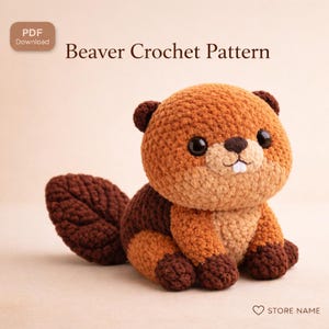 以下が含まれることがあります： かぎ針編みのビーバーのパターン。ぬいぐるみは茶色とタン色で、濃い茶色の尾とアクセントが付いています。「Beaver Crochet Pattern」というテキストがビーバーの上に表示されています。「PDF Download」ボタンが左上にあります。