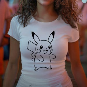May include: White t-shirt featuring a black outline illustration of Pikachu, a popular character from the Pok&eacute;mon franchise. The design is centered on the front of the shirt. The shirt has short sleeves and a crew neck.