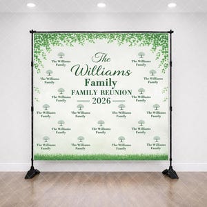 May include: A family reunion backdrop with the text "The Williams Family Family Reunion 2026" in elegant script. The design features green foliage and tree graphics, creating a festive and celebratory atmosphere. The backdrop is supported by a black metal stand.