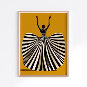 May include: A framed art print featuring a silhouette of a person with arms raised, wearing a voluminous, floor-length gown with bold black and white vertical stripes. The figure is set against a solid, vibrant mustard yellow background.