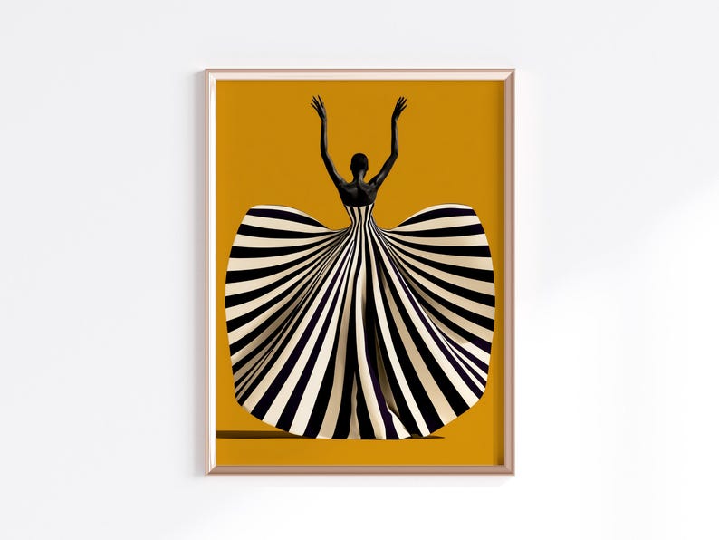 May include: A framed art print featuring a silhouette of a person with arms raised, wearing a voluminous, floor-length gown with bold black and white vertical stripes. The figure is set against a solid, vibrant mustard yellow background.