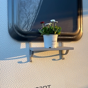 Window sill for caravan/motorhome