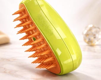 Cepillo de vapor Signature: Herramienta 3 en 1 hidratante para deslanado y masaje para gatos y perros ÉLITE paws™