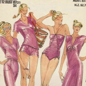 May include: Butterick pattern 3129 by John Kloss for size 12, 87cm bust. The illustration features four purple garment variations: a v-neck top with trousers, a v-neck top with shorts, a strapless swimsuit, and a long dress with a front tie.