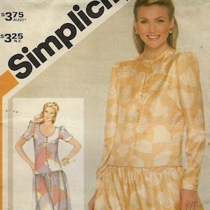 May include: A vintage sewing pattern featuring a woman wearing a long, yellow dress with a white floral print. The pattern is titled "Simplicity" and includes instructions for making the dress. The pattern is priced at £375 in Australian dollars and £325 in New Zealand dollars.