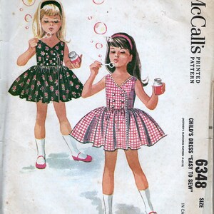 McCalls 6348 Girls double breasted wrap bodice button up dress gathered skirt Size 5 cut complete pattern c1962