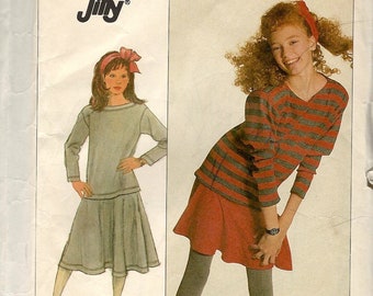 Simplicity 8197 Girls pull on circle skirt with yoke in 2 lengths and pullover long sleeve top Size 10 12 14 uncut ff sewing pattern