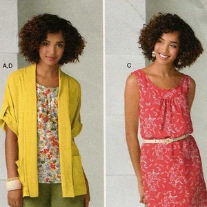May include: Simplicity easy-to-sew pattern with three outfit options. The outfits include a red floral print dress, a yellow cardigan, a white bolero jacket, and green trousers. The pattern number is 2262.