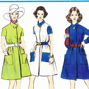 May include: A sewing pattern envelope titled VOGUE'S BASIC DESIGN 2278 featuring illustrations of five different dress styles. The designs include a lime green dress, a white dress with blue accents, a blue dress, a long white dress, and a yellow paisley dress.