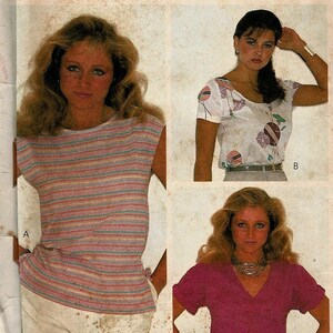 May include: Vintage McCall's sewing pattern envelope showing three women in different tops. The envelope reads "MAKE IT TONIGHT" and "WEAR IT TOMORROW!". The tops include a striped sleeveless shirt, a floral print top, and a magenta V-neck top.