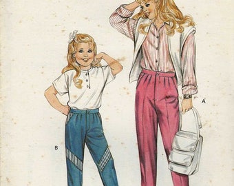 Kwik Sew 1506 Girls fly front pants trousers jeans elastic waist pleats contrast back patch pockets Sizes 4-5-6-7 uncut sewing pattern