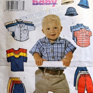 May include: A sewing pattern for baby clothes, including a plaid shirt, a striped shirt, a solid shirt, a pair of pants, and a pair of shorts. The pattern is from Butterick and the pattern number is 6030.