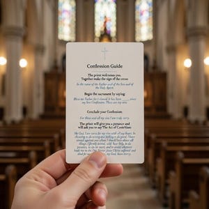 May include: A Confession Guide card with text and a cross icon is held in front of a church interior. The card's text includes instructions for confession. The background shows stained glass windows and wooden pews.