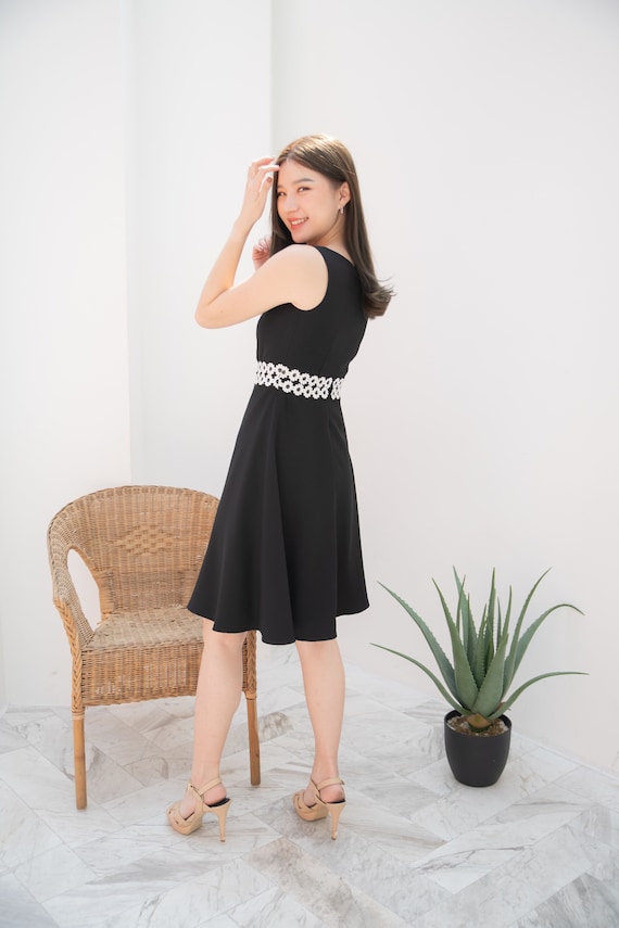 Girls black swing dress deals