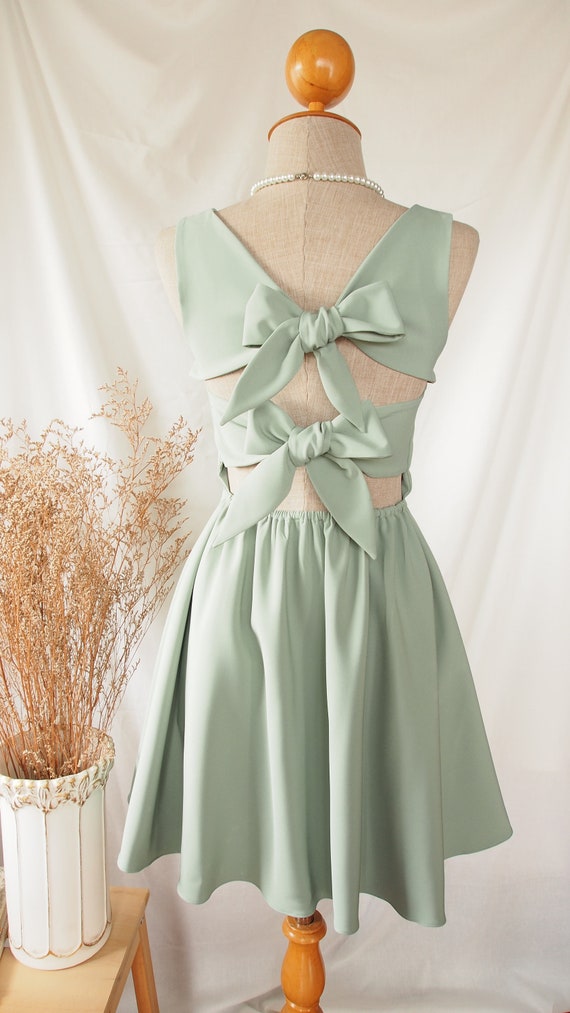 green emerald velvet dress Hunter Green Maxi Dress With Open Back And Bow