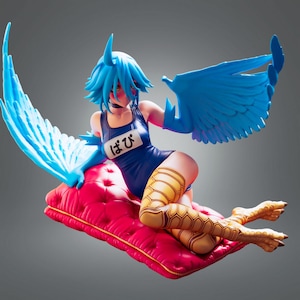May include: A figurine of a harpy-like character with blue hair and wings, wearing a blue swimsuit with Japanese text. The figure is posed on a red cushion, with detailed yellow and brown leg coverings and bird-like feet.