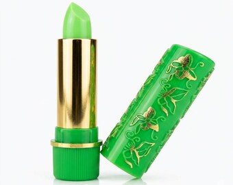 Rossetto che cambia colore verde, balsamo labbra magico in stile vintage, tinta labbra rosa in tubetto con motivo floreale retrò, cosmetico nostalgico anni '90, idea regalo