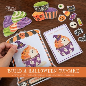 Puede incluir: Un conjunto de componentes de manualidades imprimibles con temática de Halloween que incluye bases para cupcakes, remolinos de glaseado e iconos decorativos como calabazas, fantasmas, calaveras y murciélagos junto a una tarjeta.