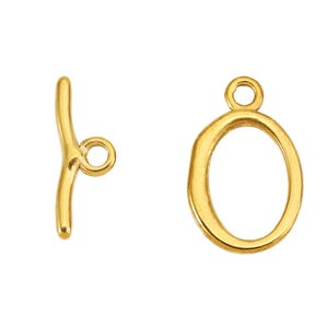 Original supplier Gold-F sample set: smaller oval ring and short curved T-bar.