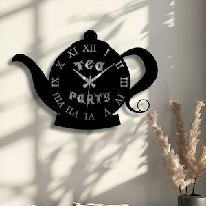 May include: A set of three ceramic mugs with a speckled, matte finish. Each mug features a different color: light blue, cream, and gray. The mugs have a simple, modern design with a rounded shape and a comfortable handle.