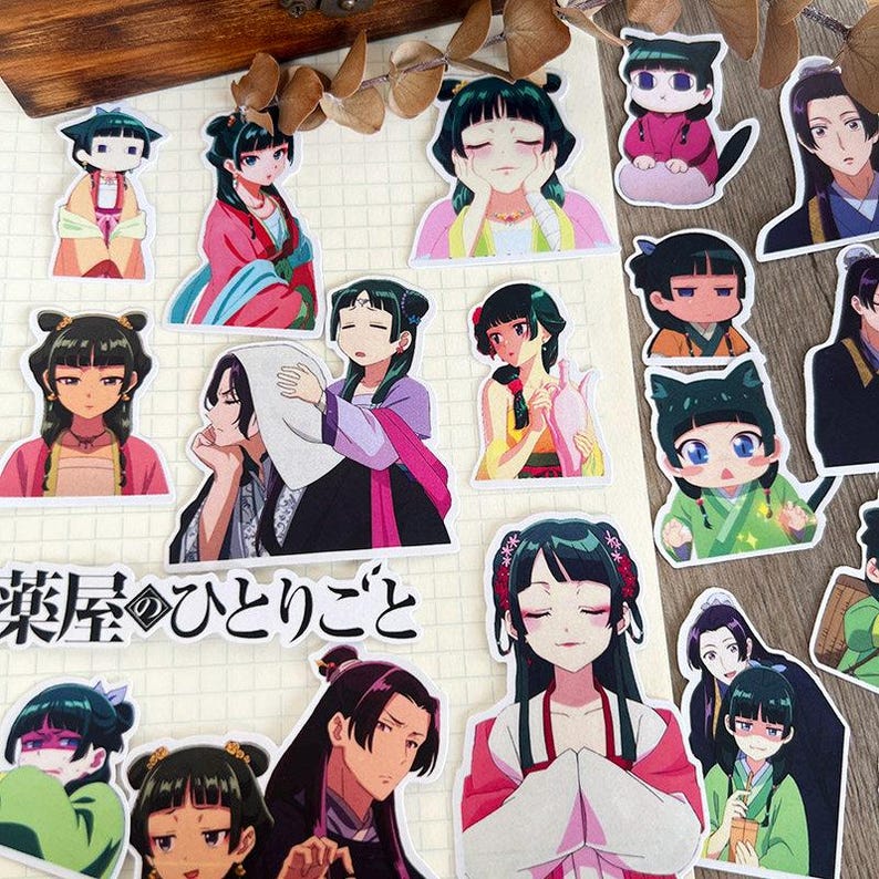 May include: A selection of anime-style stickers depicting characters in traditional Asian clothing. The stickers display diverse poses and expressions, with an emphasis on detailed facial features and vibrant attire. The stickers are pre-cut and ready for use.