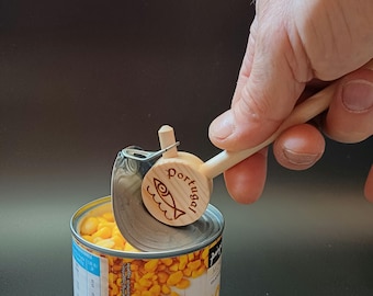 Houten blikopener met visontwerp uit Portugal