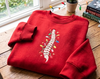 Embroidered Spine Christmas Sweatshirt, Medical Gift for Orthopedic Doctor, Nurse, PT, Rehab, Chiropractor, Gym Lover