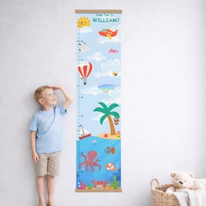 May include: A colorful height chart with a beach theme, featuring a sun, airplane, hot air balloon, and ocean creatures. The chart includes the text "How Tall Is WILLIAM?" and is designed to measure height in inches.