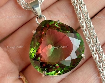 Colgante de corazón de plata alemana de 60 quilates con gema suelta que cambia de color y zultanita.