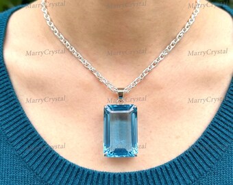 Colgante de topacio azul de calidad AA+ con forma de esmeralda, engastado en plata GS, 70 quilates. Piedra preciosa / Piedra de nacimiento de noviembre.