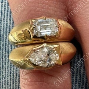 Bague en argent 925 à bord tranchant, sertie d'un diamant CZ taille poire 7 x 5 mm, serti griffes en forme de boussole, finition brillante et brossée.