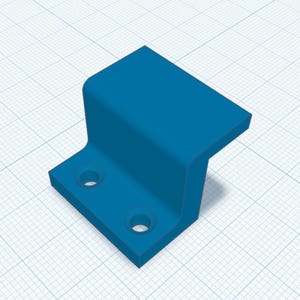 May include: A solid blue, L-shaped bracket with two circular holes on the base. The bracket has a right-angle bend and a flat top. The object is rendered in a 3D modeling style, set against a grid background.