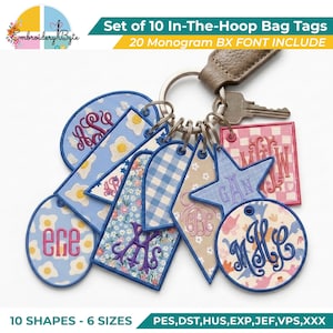 May include: A set of ten embroidered bag tags in various shapes including circles, rectangles, and a star, featuring diverse patterns like floral, gingham, and fried eggs. Each tag displays a monogram and is attached to a metal keyring.