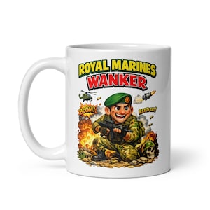 May include: White ceramic mug featuring a cartoon illustration of a soldier in camouflage, holding a rifle. The mug has the text "ROYAL MARINES WANKER" in yellow and green, with explosion and missile graphics.