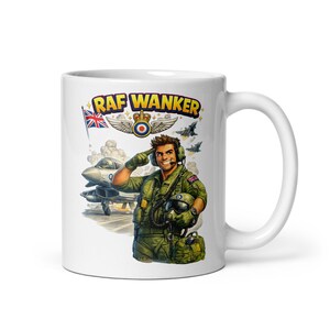 May include: White ceramic mug featuring a cartoon illustration of a saluting pilot in a green uniform, with a jet plane in the background. The mug has the text "RAF WANKER" in yellow and blue.