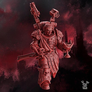 May include: A red 3D-printed miniature figure of a warrior in ornate armour, holding a chalice and a sword. The figure has a stern expression and is adorned with skulls and wings. A large weapon is mounted on the figure's back.