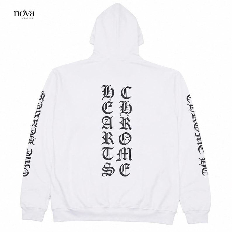 May include: White hoodie with a hood and long sleeves. The back features the text "CHROME HEARTS" in a gothic font. The sleeves also have text in a gothic font. The brand name "nova wear" is in the top left corner.