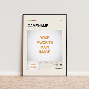 May include: A framed poster with a black border, featuring a cream-colored background. The poster includes the text "GAME NAME" and "YOUR FAVORITE MAIN IMAGE." It also has a small image box and a date, with a retro video game theme.