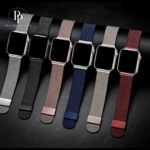 Puede incluir: Se muestran seis smartwatches con correas de diferentes colores. Las correas incluyen plata, negro, oro rosa, azul marino, beige y burdeos. Las esferas de los relojes son negras. Las correas son de material de malla.