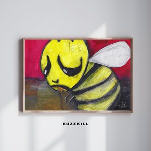 May include: A framed print of a cartoon bee with a sorrowful expression, rendered in yellow and black. The bee has a single white wing and is set against a red backdrop. The word "BUZZKILL" is printed below the image.
