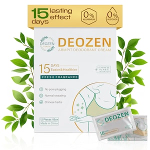 Könnte beinhalten: Eine weiße Schachtel mit Deozen-Achselhöhlen-Deodorant-Creme mit grünen Blättern. Auf der Schachtel steht "15 Tage anhaltende Wirkung", "0% Aluminium" und "0% Alkohol". Auf der Schachtel steht auch "15 Tage einfacher & gesünder" und "frischer Duft".