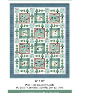 May include: A patchwork quilt with a camping theme. The quilt features squares with camping scenes, surrounded by green and blue squares and tree designs. The quilt measures 63" x 79". The text "Camping Adventures" is at the top.