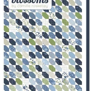May include: A quilt pattern titled Coastal by Thimble Blossoms, number 280. The design features a repeating geometric layout of diagonal blocks in shades of navy blue, light blue, white, and sage green, incorporating various floral and striped prints.