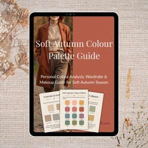 May include: A digital tablet shows a "Soft Autumn Colour Palette Guide" with colour analysis, wardrobe, and makeup advice for the Soft Autumn season. The image features a woman in a brown coat and colour palette examples.